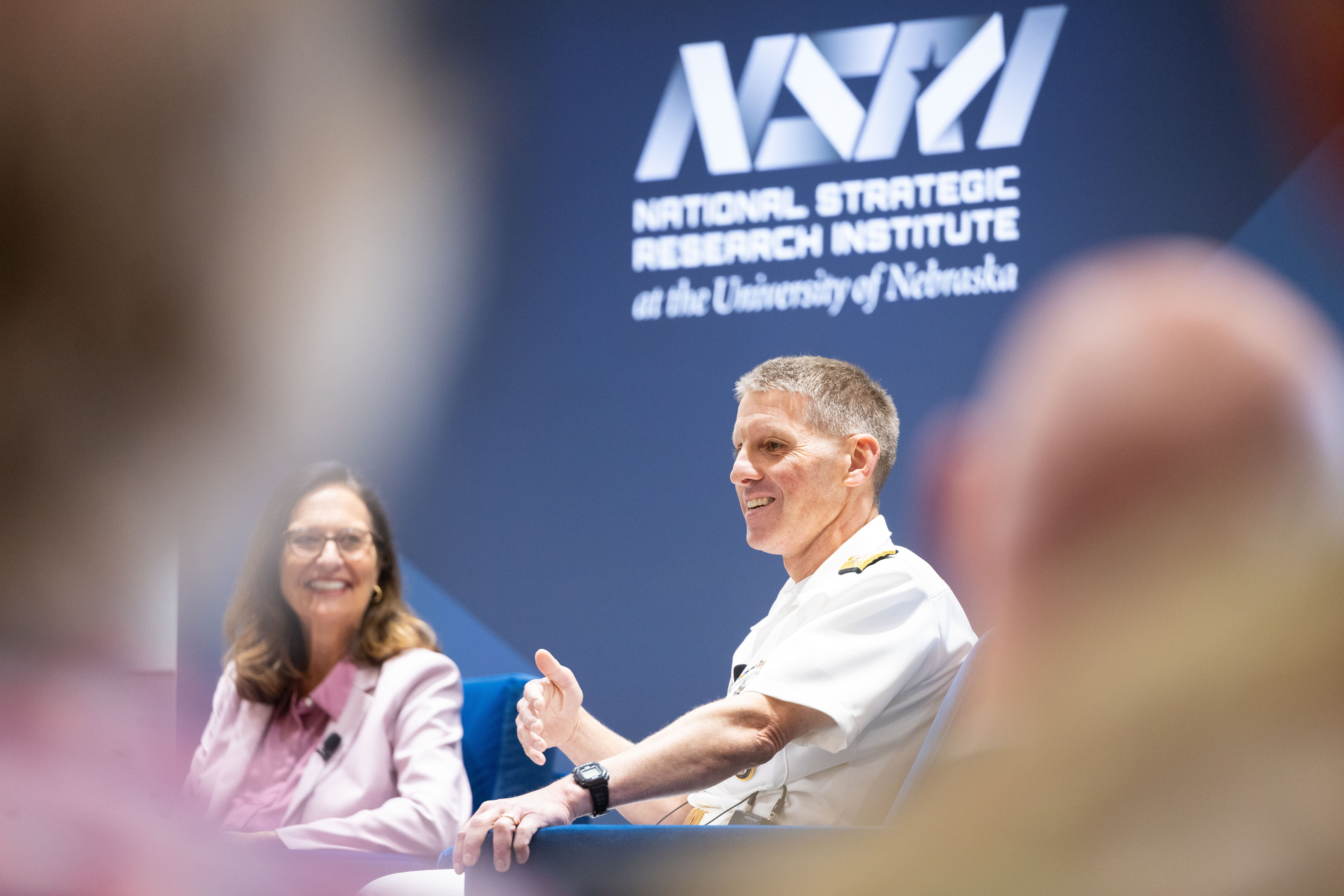 During the NSRI Research Showcase strategic dialogue, ADM Rich Correll, Commander of U.S. Strategic Command, shares operational priorities for future national security research. U.S. Senator Deb Fischer looks on as the discussion — facilitated by University of Nebraska System President Dr. Jeffrey P. Gold — underscores the urgent demand for coordinated innovation across the nation’s defense enterprise and with leading academic institutions. September 8, 2026, University of Nebraska–Lincoln East Campus Union, Lincoln, Nebraska. 